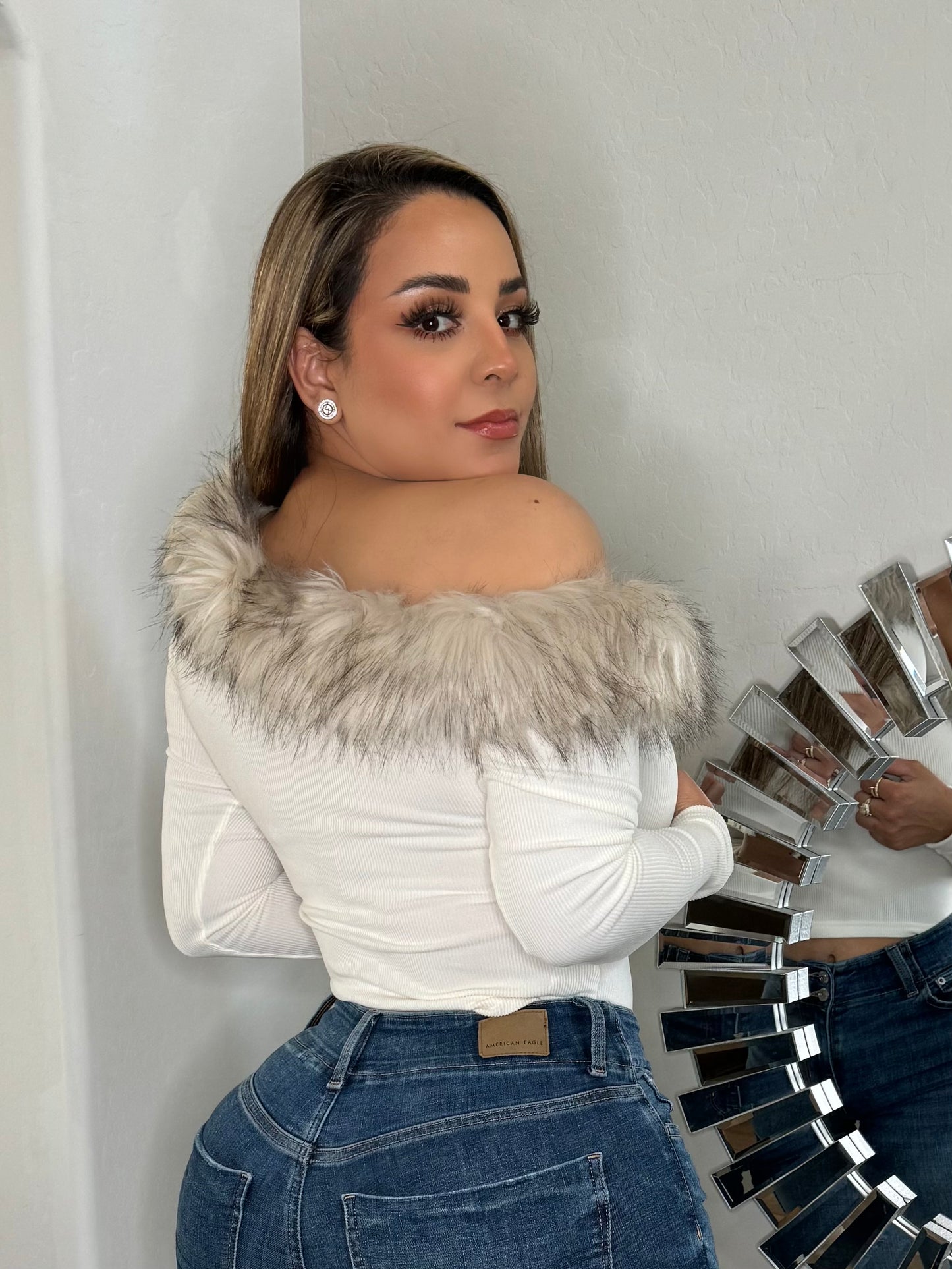 Blusa crema plumas