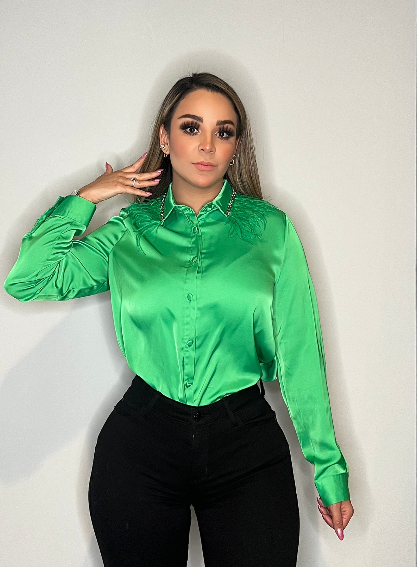 Blusa verde plumas