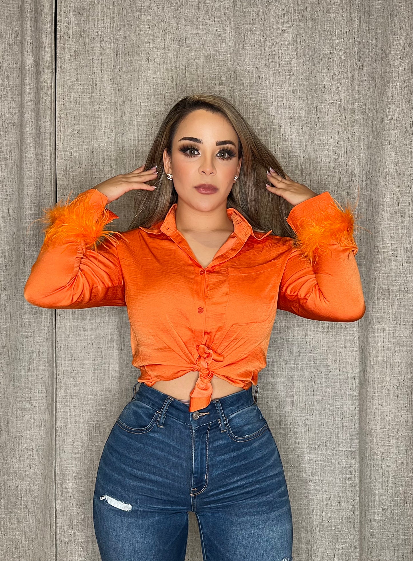 Blusa naranja plumas MD