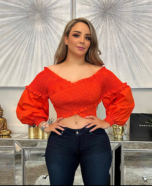 Blusa naranja esponjosa